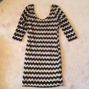 Black and champagne lacy chevron dress